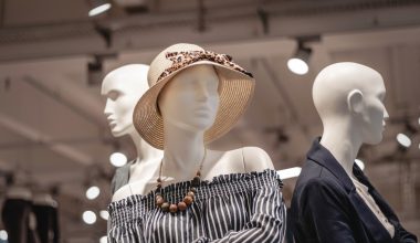 shallow focus photo of mannequin wearing brown sunhat