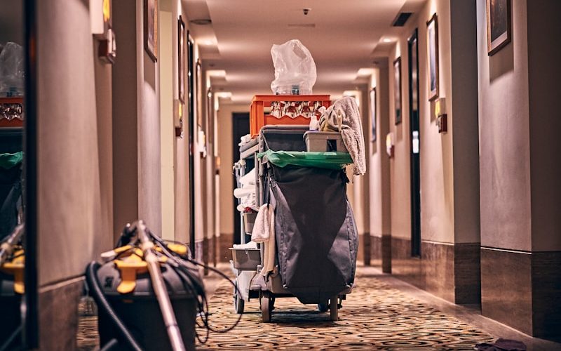 black and gray stroller on hallway