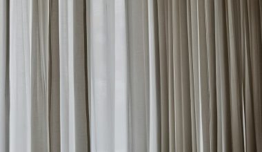 white and gray window curtain