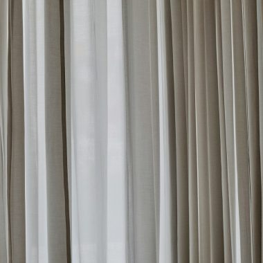 white and gray window curtain