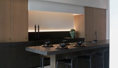 brown wooden cabinet near brown wooden cabinet