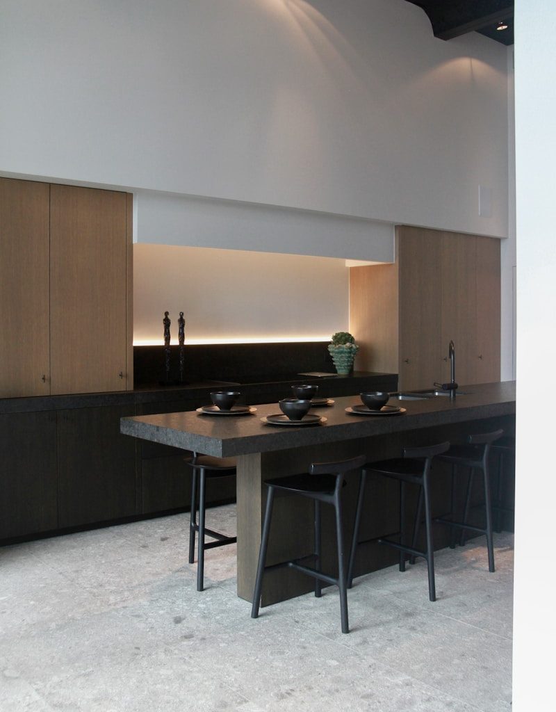 brown wooden cabinet near brown wooden cabinet