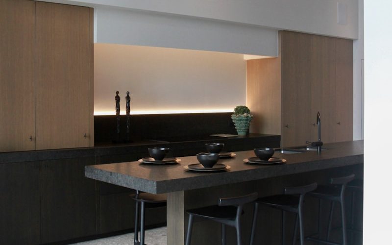 brown wooden cabinet near brown wooden cabinet